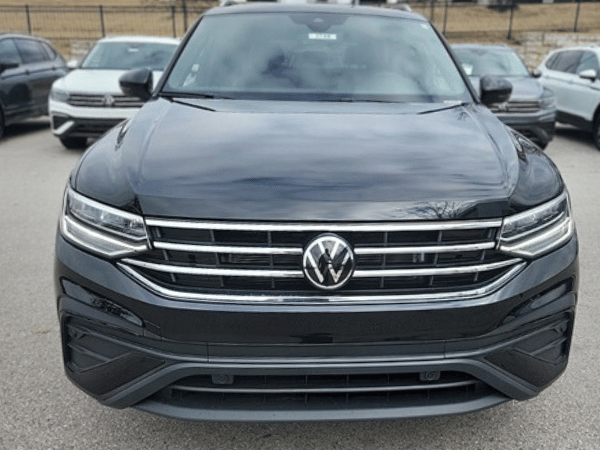 front of VW Tiguan in Fayetteville, AR