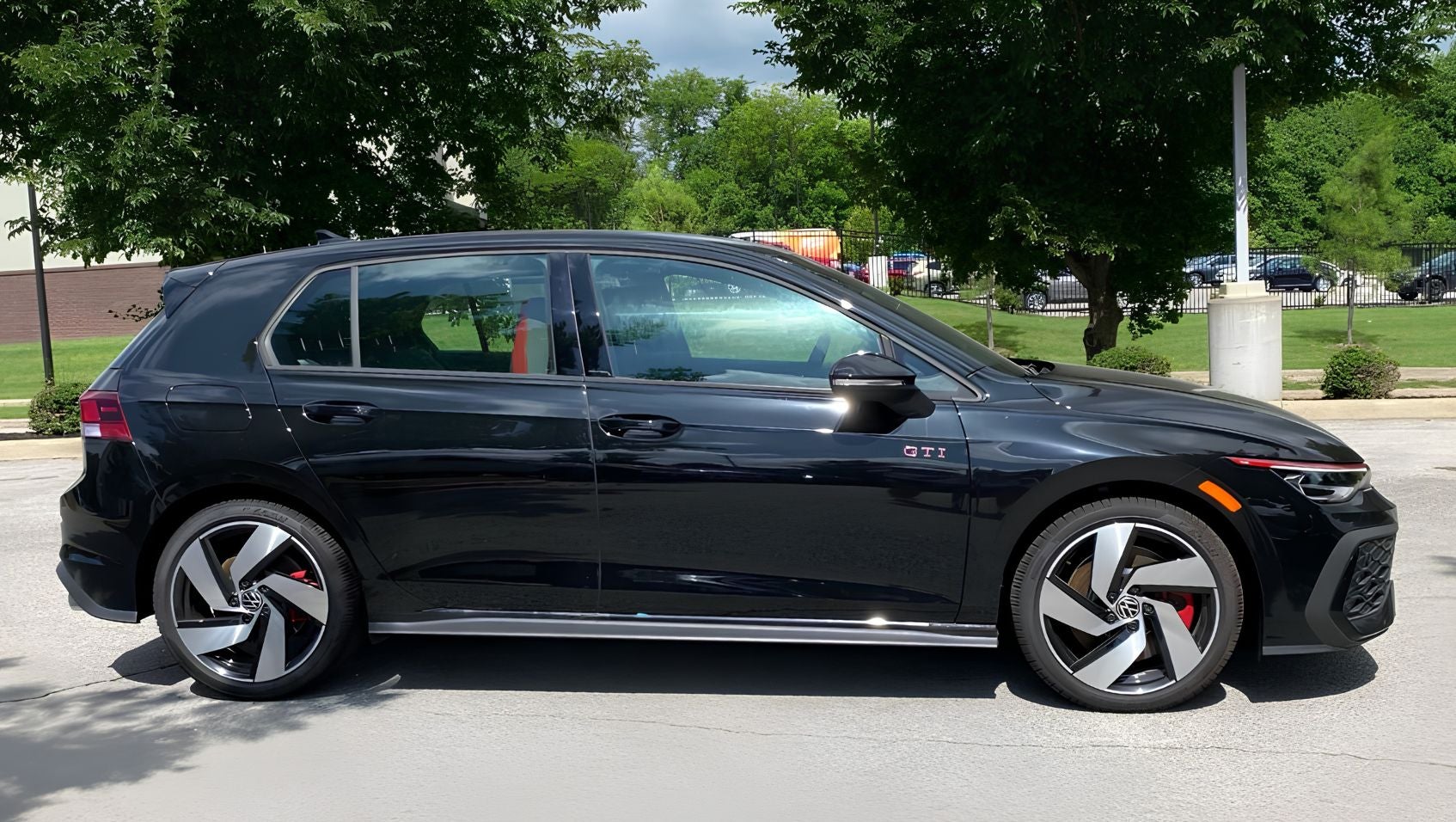 Side view of 2026 Volkswagen Golf GTI in Fayetteville, AR