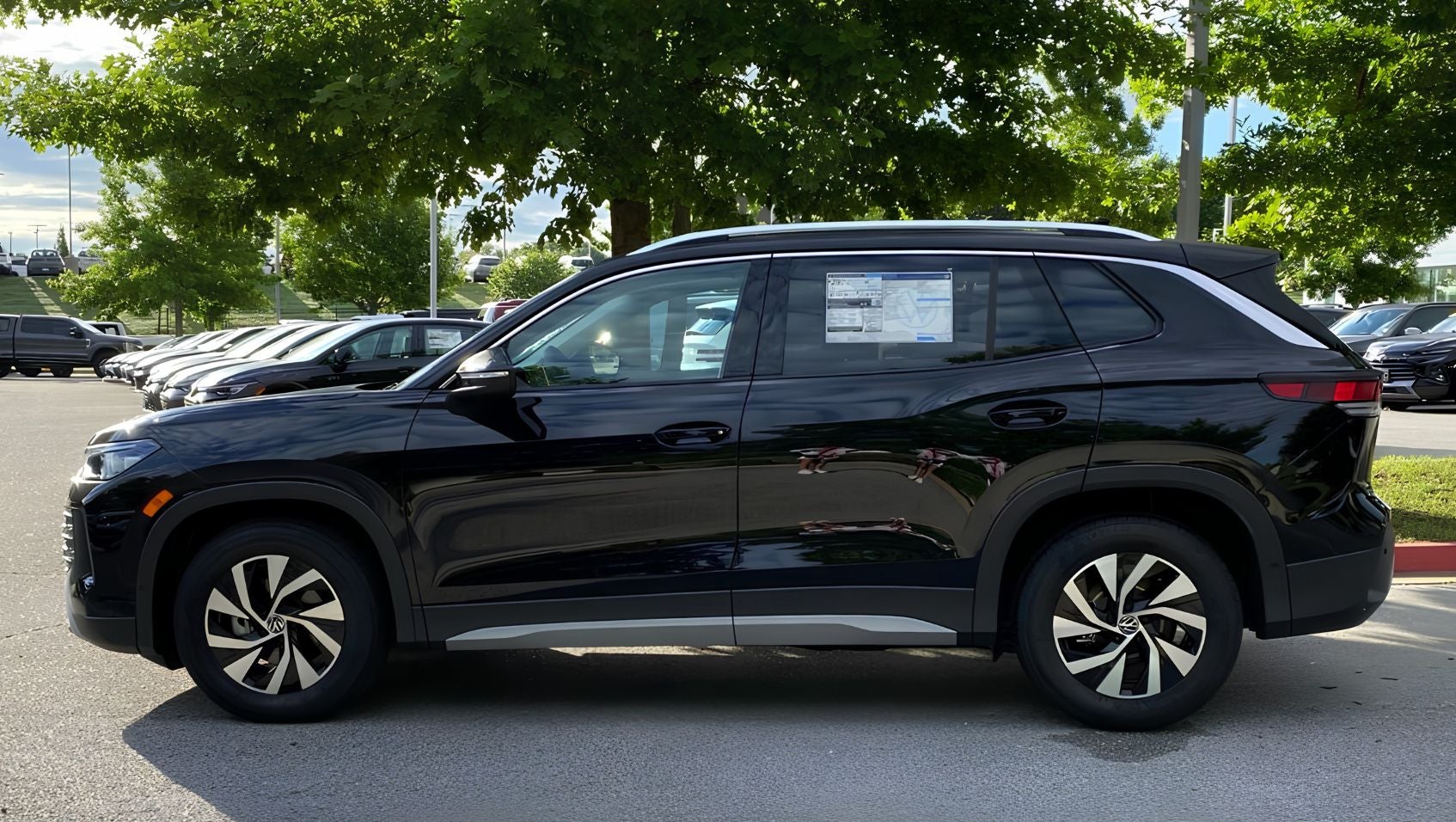 Side view of 2026 Volkswagen Tiguan in Fayetteville, AR